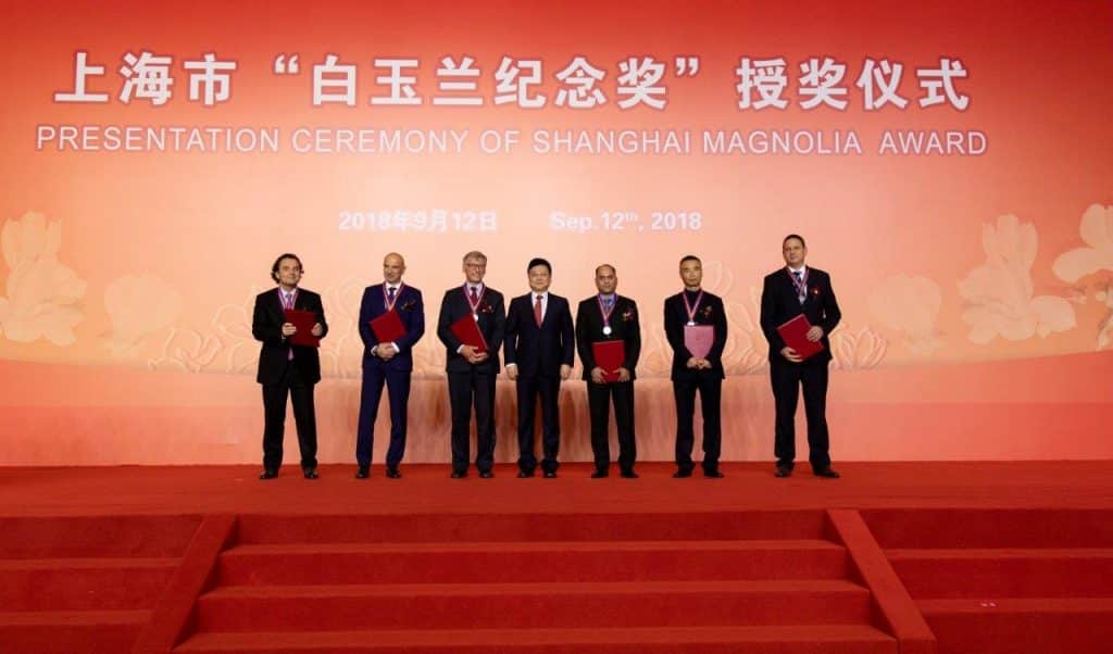 With other awardees middle is zhang xiaosong director general of municpal foreign affairs office
